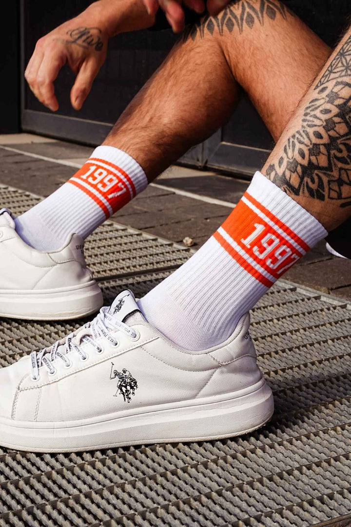 White and orange men's cotton socks with 1997 pattern – side view showing retro print and ankle fit
