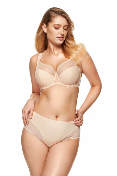 Model wearing the Zara beige smooth panty with a matching underwired bra, front view.