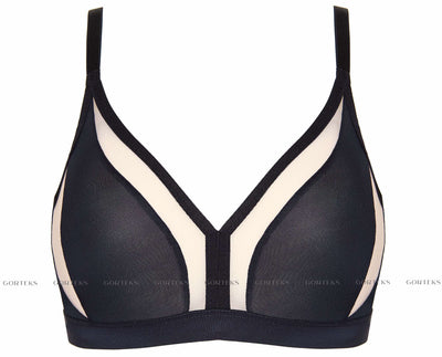 Merida wireless soft bra in black, shown flat with contrast nude mesh cup panels.