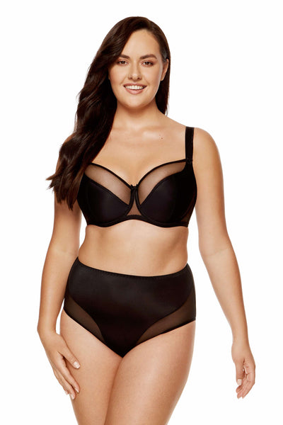 Model wearing the Zara black smooth soft bra with the matching high-waist brief.