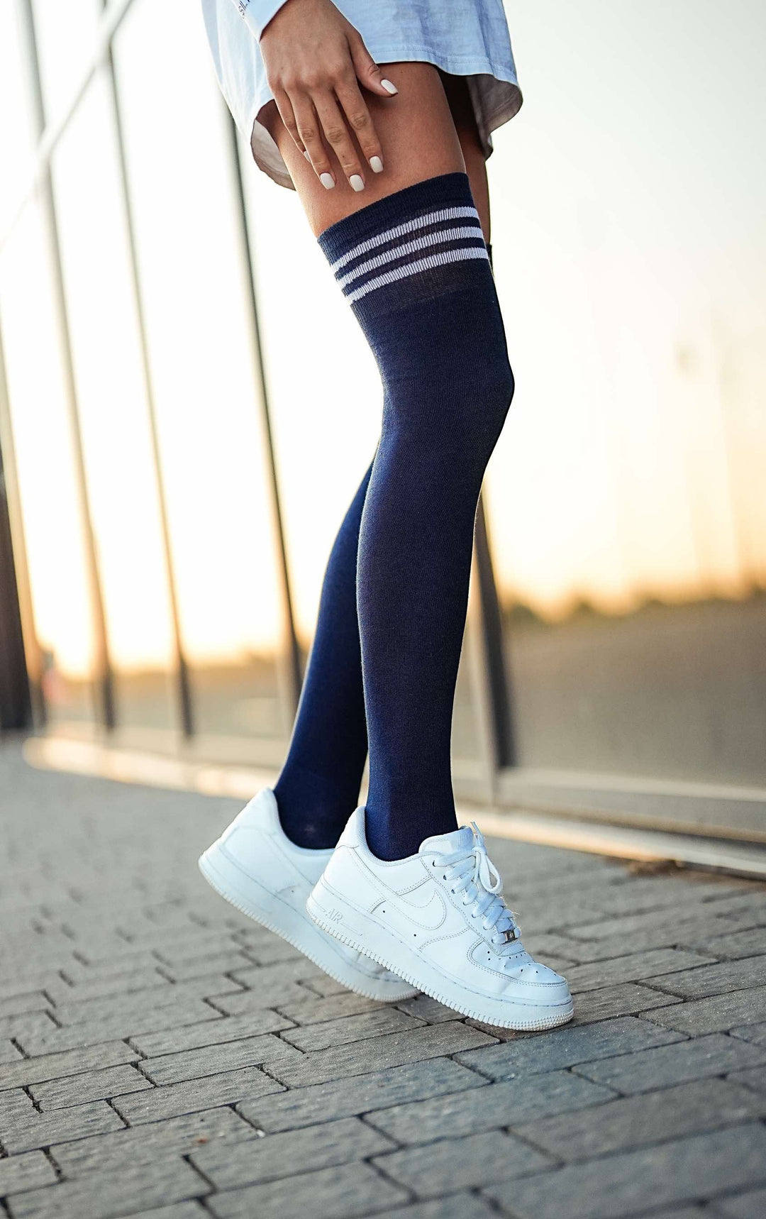 Dark navy cotton over knee socks with striped welt, perfect for stylish layering and accentuating any outfit