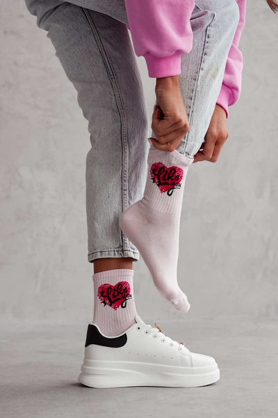 Powder pink cotton socks with "I Like You" text print – side view showing slogan and ankle fit

