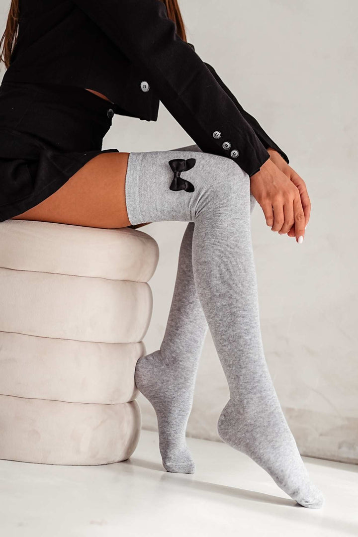 Light melange cotton over-knee socks with bow – side view showing bow detail and full length
