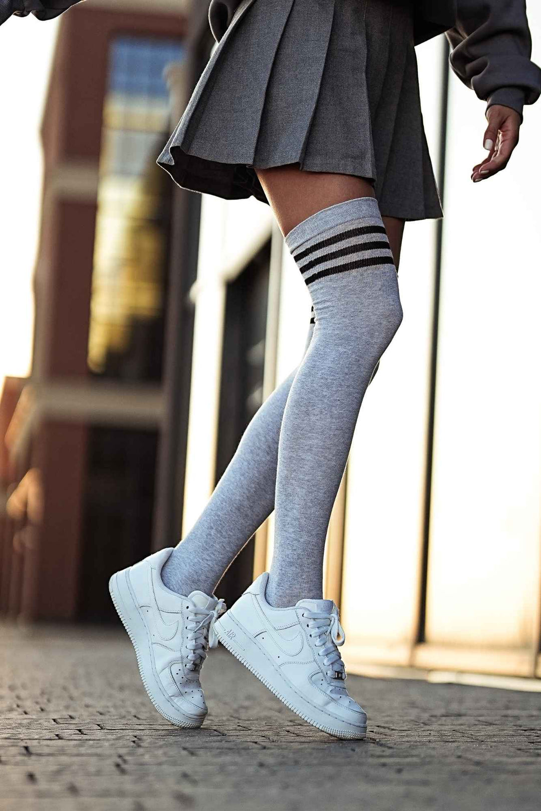 Melange and black cotton over-knee socks with striped welt – front view showing stripe detail and full length
