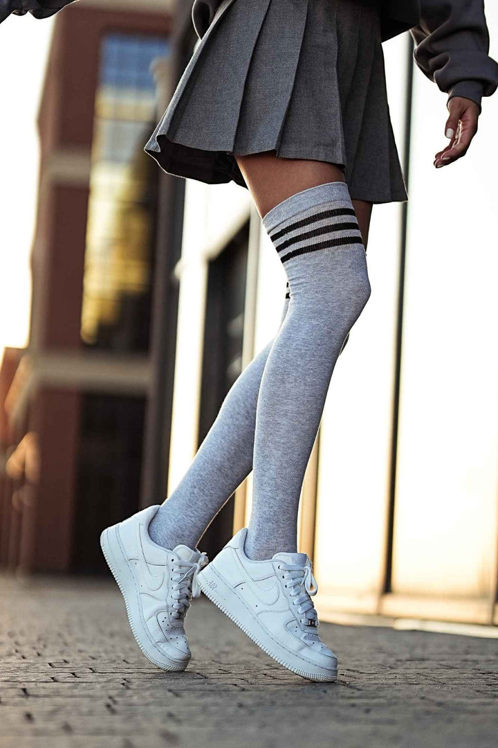 Melange and black cotton over-knee socks with striped welt – front view showing stripe detail and full length

