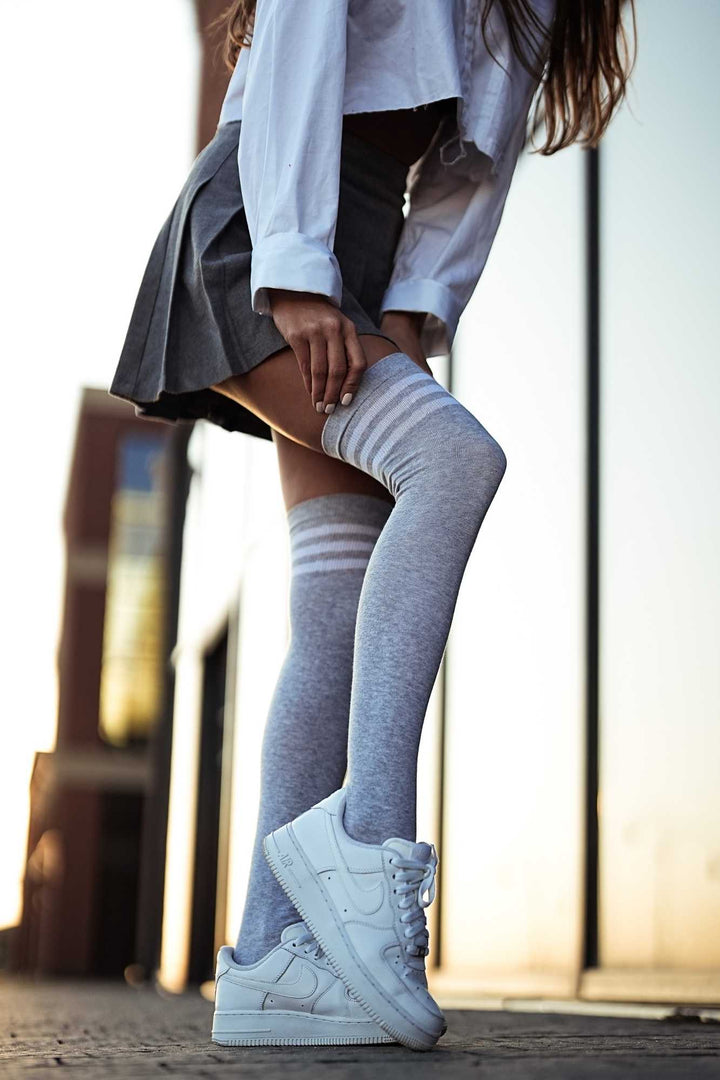 Melange and white cotton over-knee socks with striped welt – side view showing stripe detail and full length
