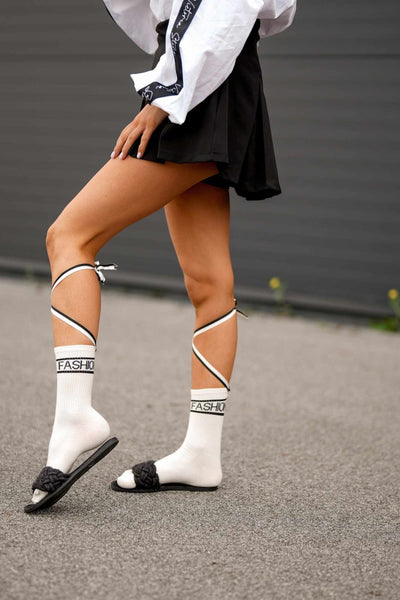 Ecru cotton ankle socks with back tie – side view showing bow detail and ankle fit
