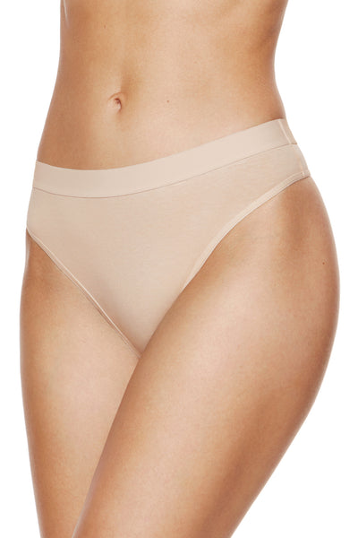 Alana beige cotton thong, front three-quarter view with a smooth covered waistband.