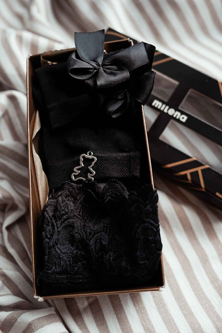 Close-up of women's exclusive black cotton sock gift set – detail view of embellishments and finish
