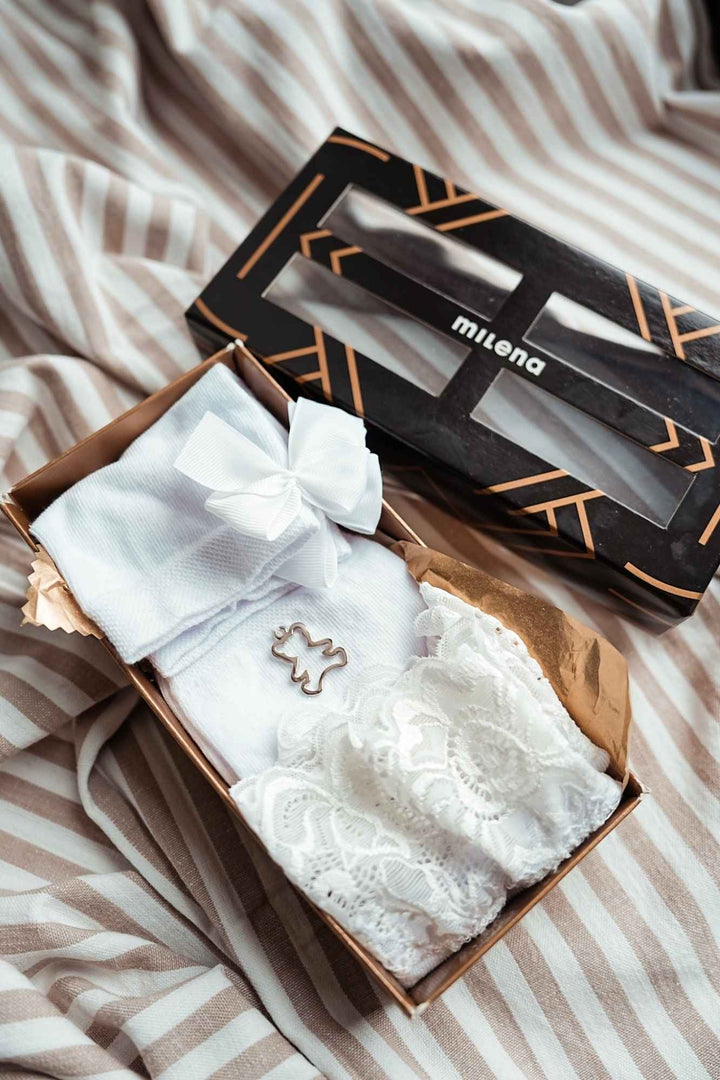 Close-up of women's exclusive white cotton sock gift set – detail view of embellishments and finish
