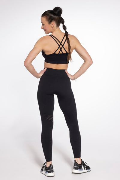 Seamless black sports bra front view alternative angle