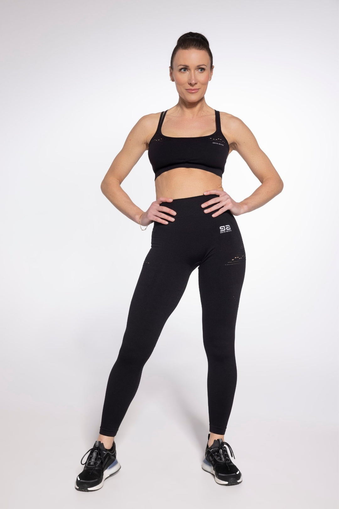Front view of black seamless fitness bra