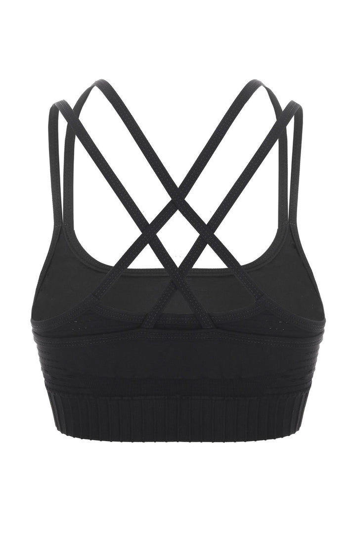 Full view of black seamless cropped fitness bra