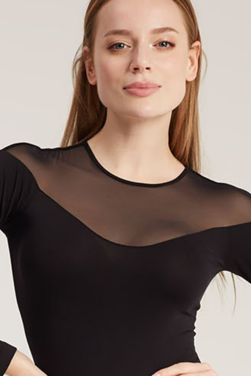 Close-up of GATTA Ariana black mesh bodysuit – sheer transparent mesh on chest and neckline
