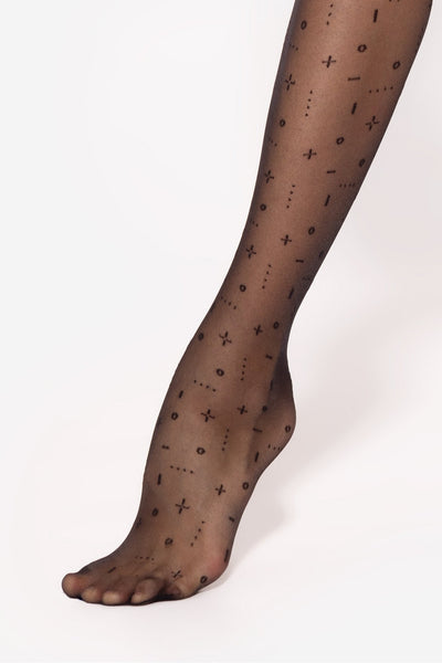 GATTA Pixi 20 DEN sheer black tights – close-up of geometric circles, lines and cross leg detail
