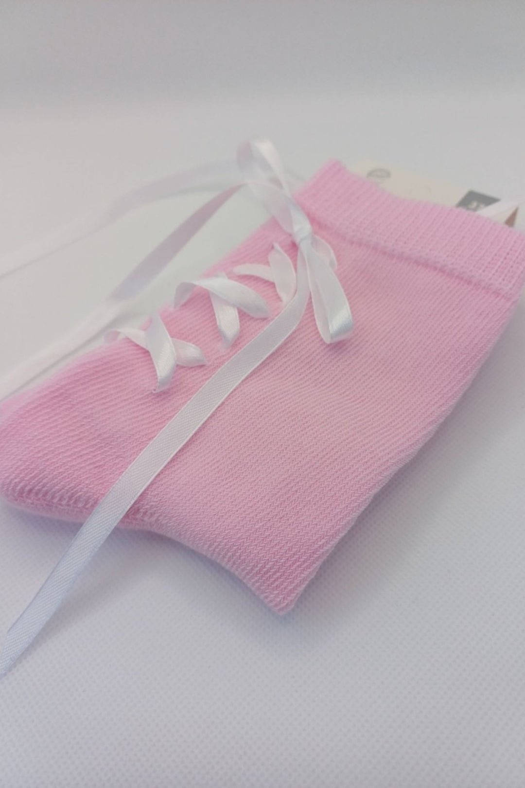 Pink lace-trim cotton socks – pair view showing delicate lace edge and ribbon heel detail
