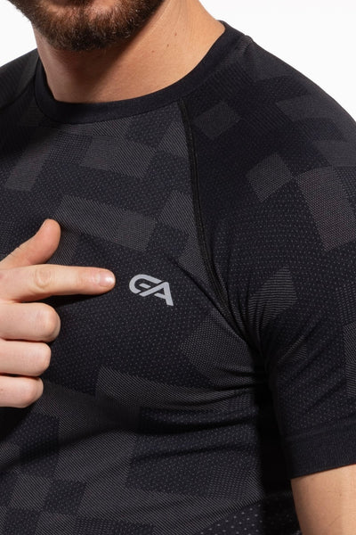Black graphite gym T-shirt front close-up, reflective element detail
