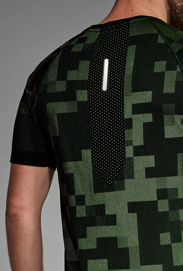 Black green training T-shirt back close-up, fabric and seam detail
