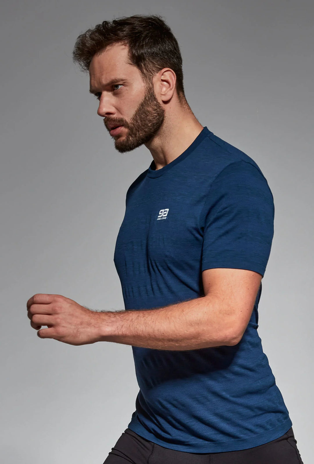 Navy blue activewear T-shirt side view, lightweight fit
