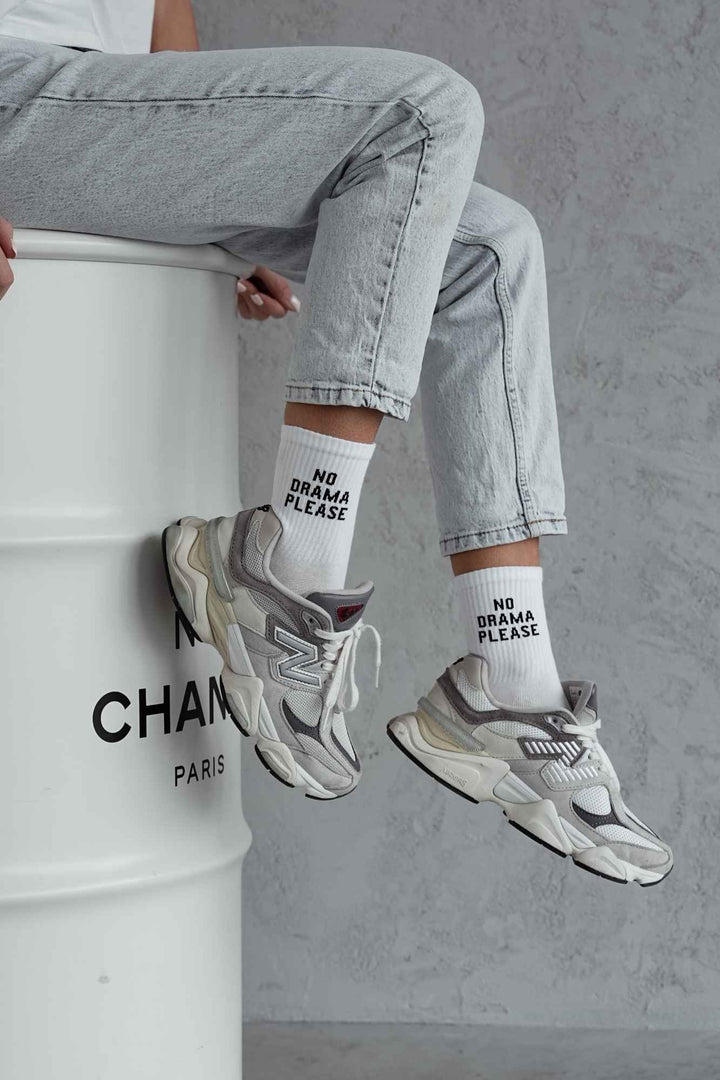 White cotton socks with "No Drama Please" text print – side view showing slogan and ankle fit
