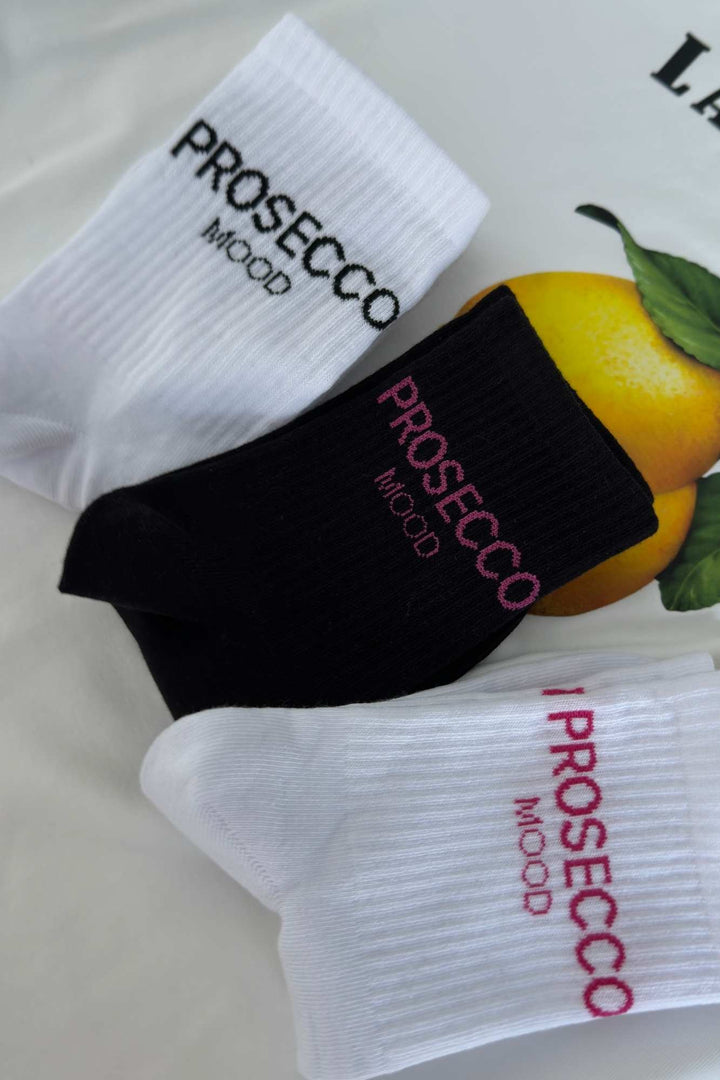 Prosecco Mood cotton socks in black, white-pink and white-black – all three colourways shown together
