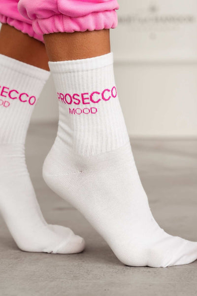Close-up of white and pink Prosecco Mood cotton socks – lettering detail on soft breathable fabric
