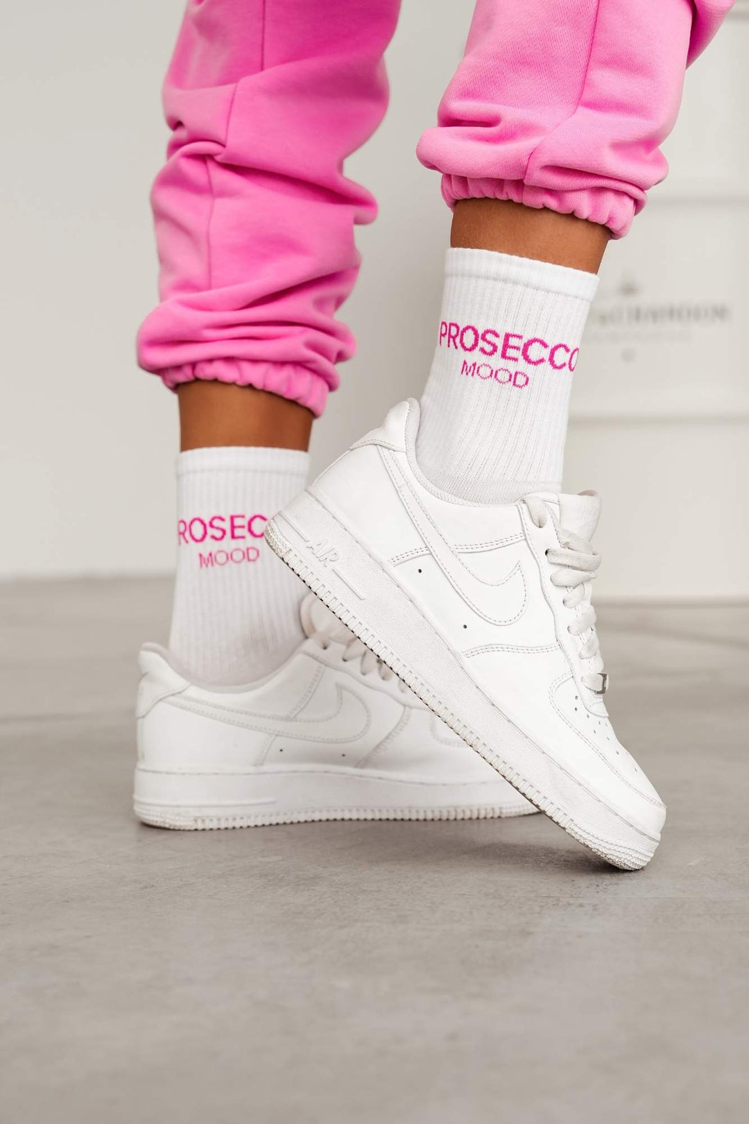 White and pink Prosecco Mood cotton socks styled with shoes – side view showing pattern and length
