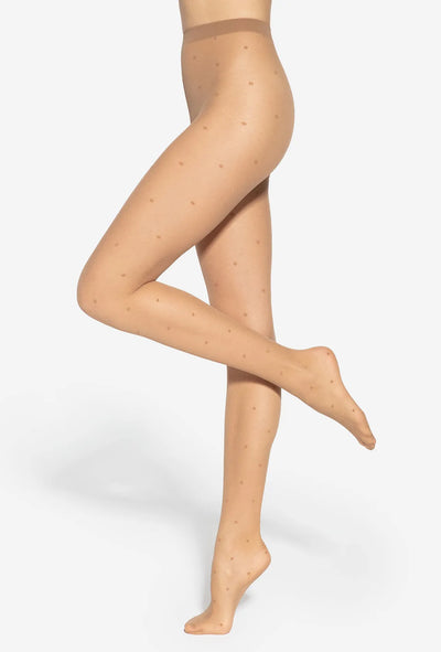 Gatta Funny transparent tights in tan with an all-over dot pattern, front view, leg raised.
