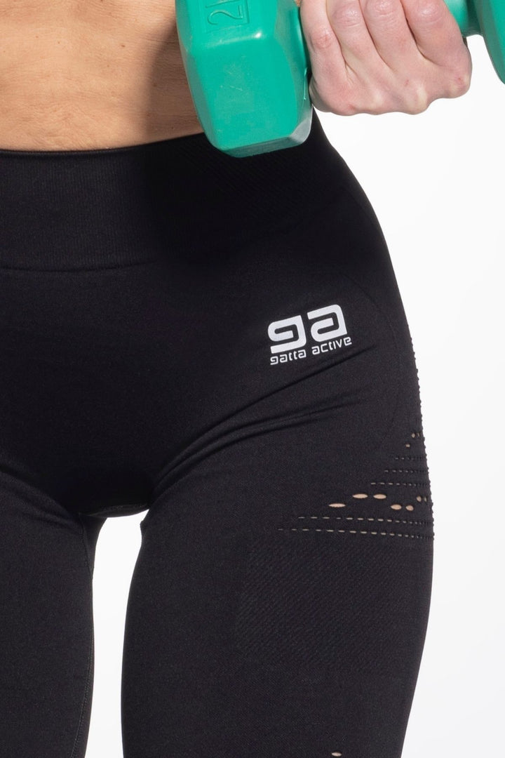 Black fitness leggings wide waistband close-up

