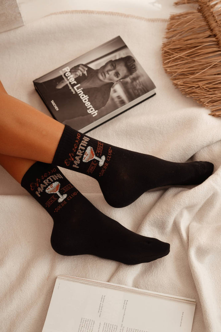 Spanties Espresso Martini cotton socks in black – side view showing pattern detail and fit
