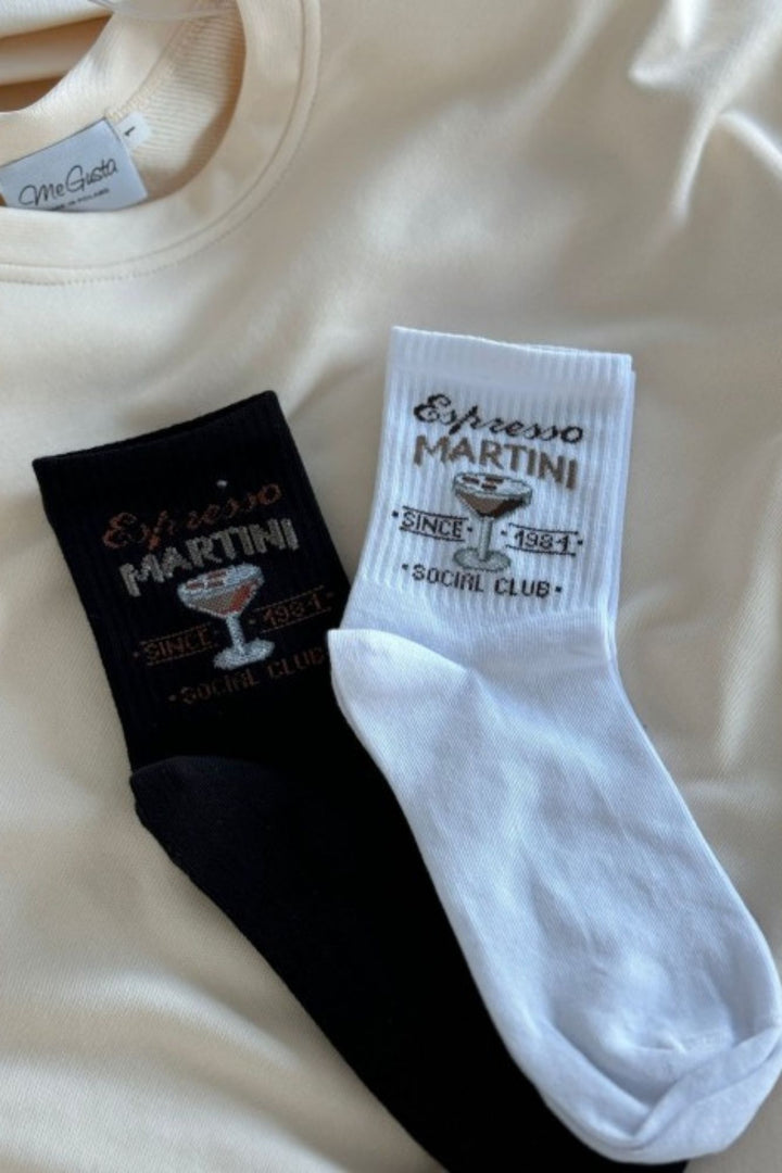 Spanties Espresso Martini cotton socks in black and white – both colourways shown together
