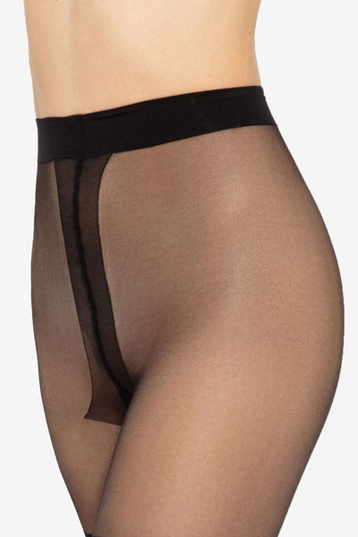 Close-up of the Girl-Up tights' flat black waistband and sheer knit at the hip.