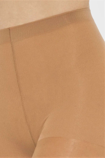 Close-up of the Laura golden tan tights' flat waistband and fine seam at the front.