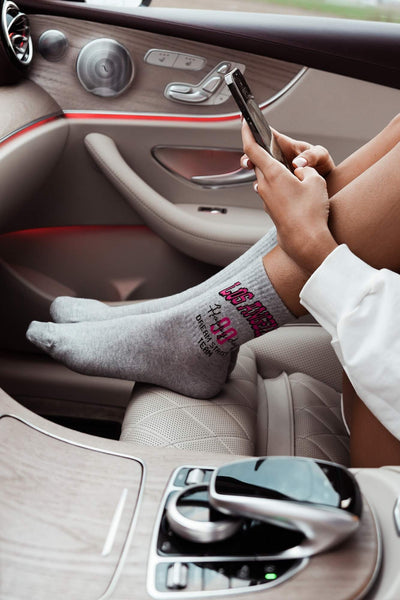 Spanties Los Angeles cotton socks in light melange – side view showing "Los Angeles" text print

