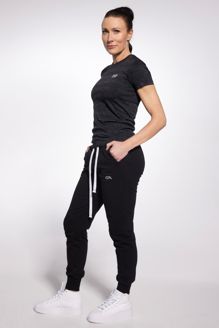 Black activewear T-shirt side view, full length

