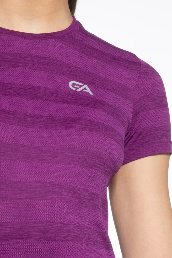 Purple women's gym top front close-up, lightweight fabric detail
